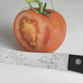 FRÜHSTÜCK cut and eat black cutting of tomatoes